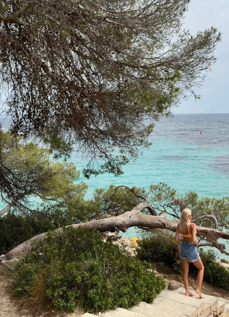 Alena Kulikova looking out over a bay on the Mallorca coast
