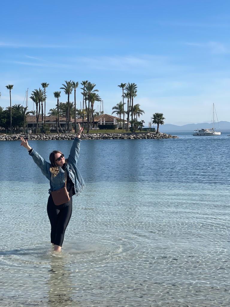 Lena by the sea while travelling