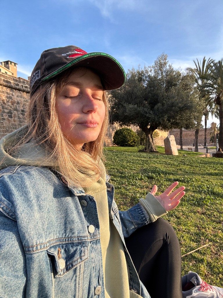 Lena meditating in nature